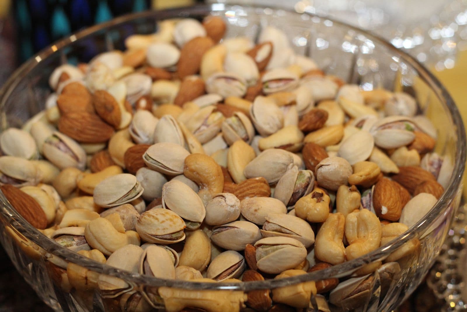 Mixed nuts and dried fruit in a glass bowl